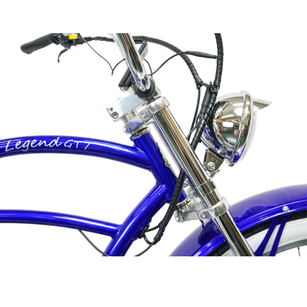 Close up of Tracer Legend Cruiser Electric Bike Chrome Bright Headlight Sturdy Fork and Stem