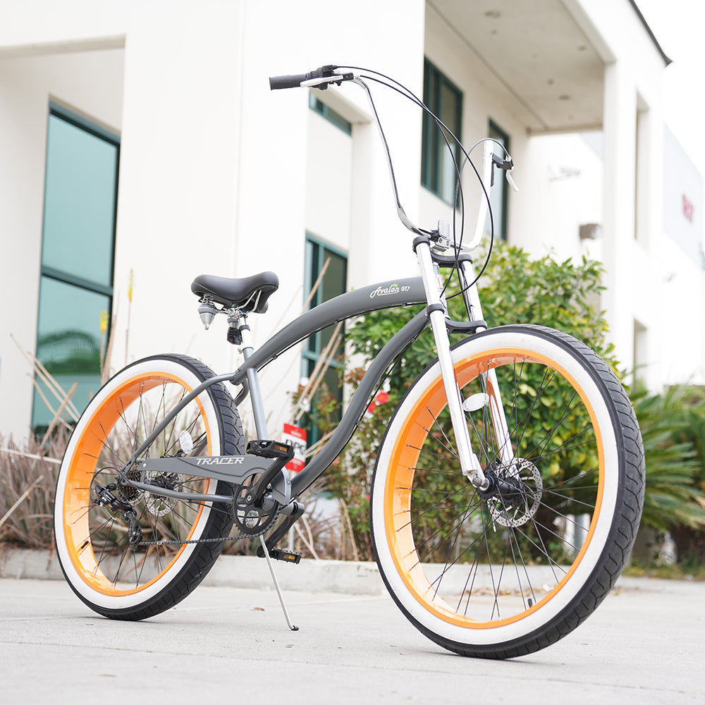 side view of Tracer Avalon GT7 29" Beach Cruiser Bikes in grey orange rim